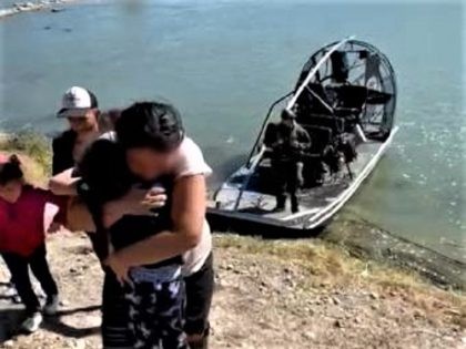 A migrant mother is reunited with her five-year-old daughter after Border Patrol agents rescued her from an Island near Eagle Pass, Texas. (Photo: U.S. Border Patrol/Del Rio Sector)