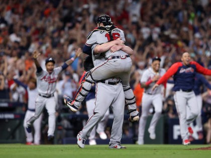 HOUSTON, TEXAS - NOVEMBER 02: The Atlanta Braves celebrate the team's 7-0 win against the Houston Astros in Game Six to win the 2021 World Series at Minute Maid Park on November 02, 2021 in Houston, Texas. (Photo by Elsa/Getty Images)