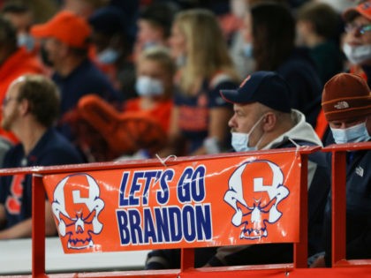 A sign reading "Let's go Brandon" is displayed on the railing in the first half of an NCAA college football game between Boston College and Syracuse in Syracuse, N.Y., Saturday, Oct. 30, 2021. Critics of President Joe Biden have come up with the cryptic new phrase to insult the Democratic …