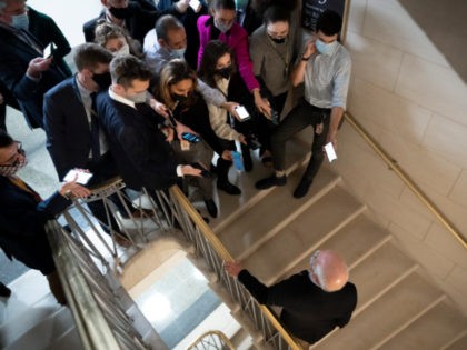 WASHINGTON, DC - NOVEMBER 05: Reporters try to talk to Rep. Peter Welch (D-VT) as he leaves a House Progressive Caucus meeting on Capitol Hill November 05, 2021 in Washington, DC. After months of negotiations between progressives and moderates, House Democrats hope to hold votes on the bipartisan infrastructure bill …