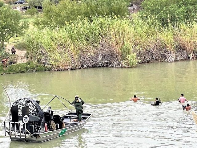 Laredo Marine Unit agents turn back a group of migrants crossing the Rio Grande. (Photo: U.S. Border Patrol/Laredo Sector)