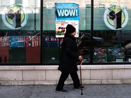 NEW YORK, NEW YORK - DECEMBER 11: People walk by a Dollar Tree store on December 11, 2018