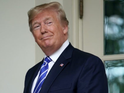 WASHINGTON, DC - JULY 31: U.S. President Donald Trump looks back at journalists after welcoming Mongolian President Battulga Khaltmaa to the White House July 31, 2019 in Washington, DC. Khaltmaa, who traveled to the White House to seek trade and military deals with the United States, also symbolically gifted a …