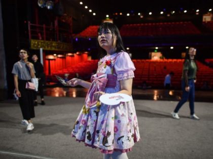 This photo taken on August 30, 2019 shows transgender Alice (C), a member of the Trans Chorus, during rehearsal at a theatre one day before the group's musical presentation at a festival in the city of Chengdu in China's Sichuan province. - In China, where no official numbers of transgender …