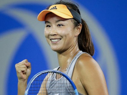 Shuai Peng of China reacts during the match against Garbine Muguruza of Spain on Day 2 of 2019 Dongfeng Motor Wuhan Open at Optics Valley International Tennis Center on September 23, 2019 in Wuhan, China. (Wang He/Getty Images)
