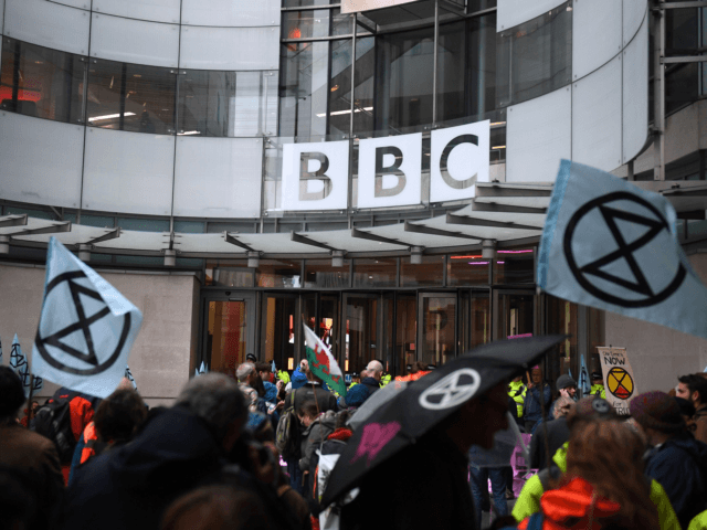 Climate activists protest at the BBC offices during the fifth day of demonstrations by the climate change action group Extinction Rebellion, in London, on October 11, 2019. - London police have reported making more than 1,000 arrests over four days of protests by the group Extinction Rebellion, which have been …