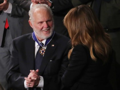 WASHINGTON, DC - FEBRUARY 04: Radio personality Rush Limbaugh reacts after First Lady Melania Trump gives him the Presidential Medal of Freedom during the State of the Union address in the chamber of the U.S. House of Representatives on February 04, 2020 in Washington, DC. President Trump delivers his third …