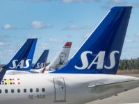 Climate Activists Glue Themselves to Airport Runway During Protest