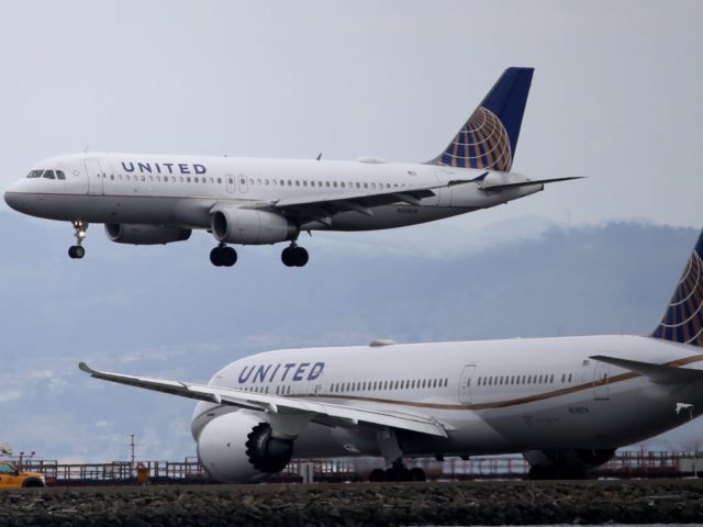 BURLINGAME, CALIFORNIA - MARCH 06: A United Airlines plane lands at San Francisco Internat
