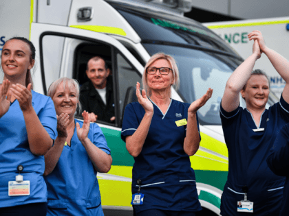 GLASGOW, UNITED KINGDOM - APRIL 23: NHS staff at the Queen Elizabeth Hospital participate in the Clap for Carers and key workers after month of lockdown on April 23, 2020, in Glasgow, United Kingdom. Following the success of the "Clap for Our Carers" campaign, members of the public are being …