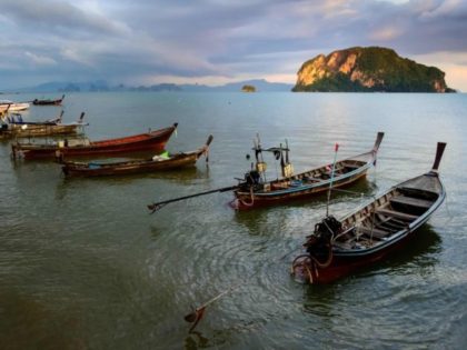 TOPSHOT - This photograph taken on November 24, 2020 shows traditional longtail boats on Koh Yao Yai island in the Andaman Sea. (Photo by Mladen ANTONOV / AFP) (Photo by MLADEN ANTONOV/AFP via Getty Images)