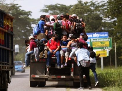 SAN PEDRO SULA, HONDURAS - JANUARY 15: Truckers serve as transportation for the migrants who go in the caravan, facilitating their arrival at the Honduran border with Guatemala and thus being able to reach the United States informacion especifica on January 14, 2021 in San Pedro Sula, Honduras. The caravan …