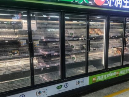 This photo taken on August 2, 2021 shows empty shelves as people buy items at a supermarket in Wuhan, in China's central Hubei province, as authorities said they would test its entire population for Covid-19 after the central Chinese city where the coronavirus emerged reported its first local infections in …
