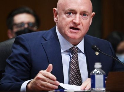 US Senator Mark Kelly, Democrat of Arizona, speaks during the Senate Finance Committee hearing on the nomination of Chris Magnus to be the next US Customs and Border Protection Commissioner, on Capitol Hill in Washington, DC, October 19, 2021. (Photo by MANDEL NGAN / POOL / AFP) (Photo by MANDEL …