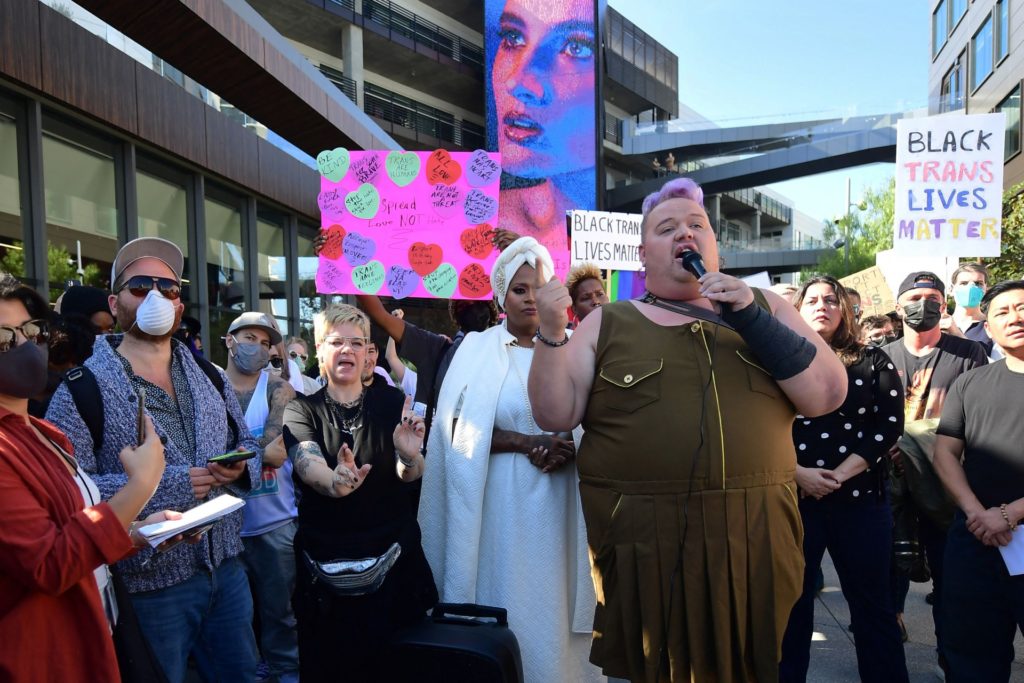 People rally in support of the Netflix transgender walkout in Los Angeles, California on October 20, 2021. - Netflix bosses braced for an employee walkout and rally in Los Angeles on October 20, 2021 as anger swelled over a new Dave Chappelle comedy special that activists say is harmful to the transgender community. (Photo by Frederic J. BROWN / AFP) (Photo by FREDERIC J. BROWN/AFP via Getty Images)