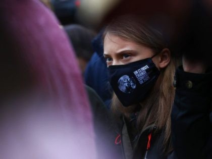 Swedish climate activist Greta Thunberg takes part in a protest at Festival Park in Glasgo