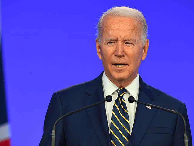 US President Joe Biden presents his national statement during day two of COP26 at SECC on