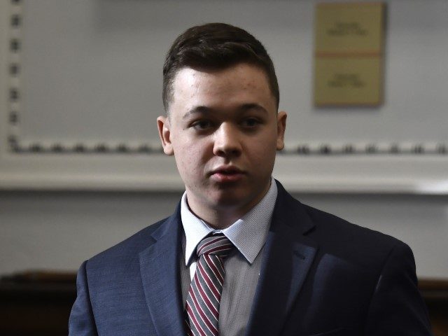 Kyle Rittenhouse enters the courtroom at the Kenosha County Courthouse on November 8, 2021 in Kenosha, Wisconsin. Rittenhouse is accused of shooting three demonstrators, killing two of them, during a night of unrest that erupted in Kenosha after a police officer shot Jacob Blake seven times in the back while …