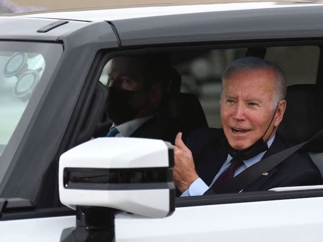 US President Joe Biden test drives an electric hummer as he tours the General Motors Factory ZERO electric vehicle assembly plant in Detroit, Michigan on November 17, 2021. (Photo by MANDEL NGAN / AFP) (Photo by MANDEL NGAN/AFP via Getty Images)