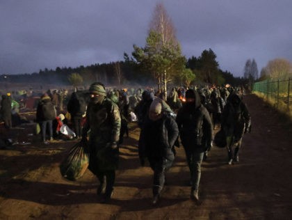 Migrants aiming to cross into Poland camp near the Bruzgi-Kuznica border crossing on the B