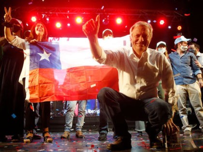 SANTIAGO, CHILE - NOVEMBER 18: Chilean presidential candidate Jose Antonio Kast of the Republican Party greets supporters during the presidential elections campaign closing rally on November 18, 2021 in Santiago, Chile. Chileans will go to polls on November 21. (Photo by Marcelo Hernandez/Getty Images)