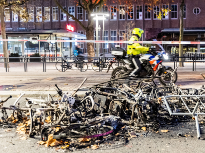This photograph taken on November 20, 2021 shows burned bikes after a protest against the
