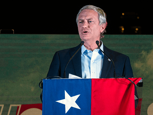 Chilean presidential candidate Jose Antonio Kast, from the Partido Republicano party, addresses supporters outside the general headquarters in Santiago on November 21, 2021, following the first results of the general election. - With 65 percent of votes counted, far-right candidate Jose Antonio Kast, 55, of the Republican Party, was ahead …