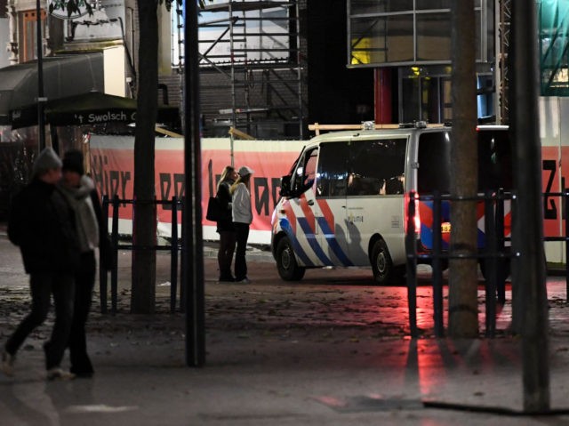 Police patrol around the centre of the Dutch northern city of Zwolle, on November 22, 2021, where an emergency order has been issued after three nights of unrest in the Netherlands over new anti-Covid19 measures. - The Netherlands is taking stock after a weekend that saw dozens of violent protests …