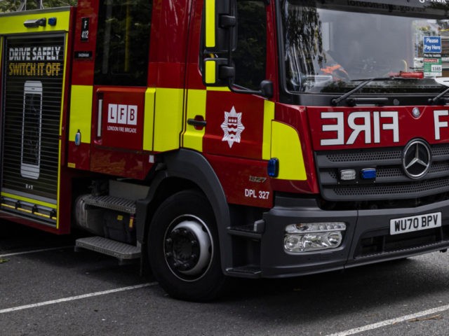 LONDON, ENGLAND - JULY 26: Fire engines are seen outside the main entrance to Whipps Cross