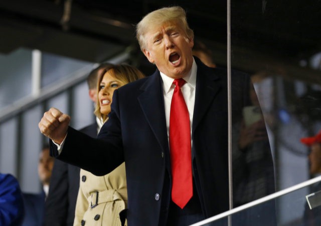 ATLANTA, GEORGIA - OCTOBER 30: Former president of the United States Donald Trump waves pr