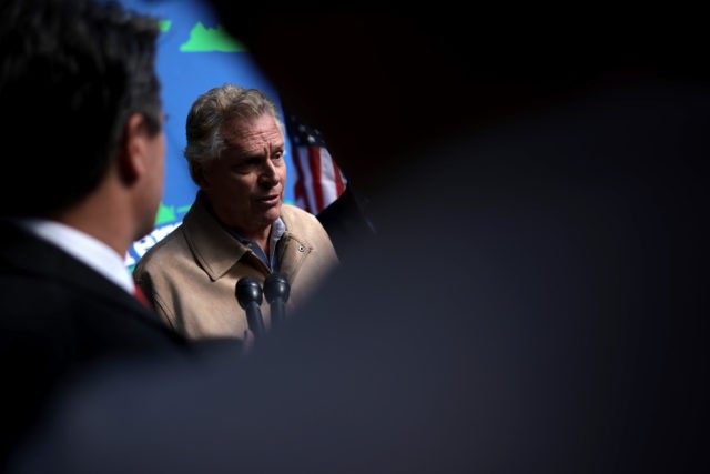 ROANOKE, VIRGINIA - NOVEMBER 01: Democratic gubernatorial candidate, former Virginia Gov. Terry McAuliffe answers questions from reporters after speaking at a campaign event at the Sweet Donkey Coffee November 1, 2021 in Roanoke, Virginia. The Virginia gubernatorial election, pitting McAuliffe against Republican candidate Glenn Youngkin, will be held tomorrow. (Photo …