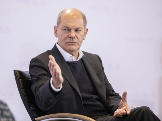 BERLIN, GERMANY - NOVEMBER 12: Olaf Scholz, German Social Democrat (SPD) and likely the next chancellor of Germany, speaks with climate activists Lena Bonasera and Henning Leschke (not seen) at the Friedrich Ebert Foundation on November 12, 2021 in Berlin, Germany. Bonasera and Leschke both went on a hunger strike …