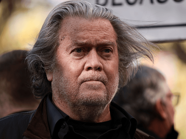 Former Trump Administration White House advisor Steve Bannon listens as attorney David Schoen speaks to reporters outside of the E. Barrett Prettyman Federal District Court House on November 15, 2021 in Washington, DC. Bannon is charged with two counts of contempt due to his refusal to appear for a deposition …