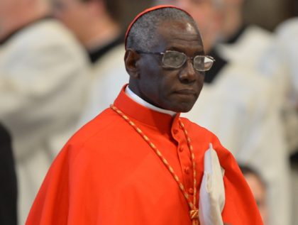 Guinean cardinal Robert Sarah attends a mass at the St Peter's basilica on March 12, 2013 at the Vatican. Cardinals moved into the Vatican today as the suspense mounted ahead of a secret papal election with no clear frontrunner to steer the Catholic world through troubled waters after Benedict XVI's …