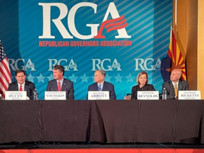Gov. Doug Ducey of Arizona, left, speaks to reporters while Gov.-elect Glen Youngkin, of Virginia, Govs. Greg Abbott, of Texas, and Kim Reynolds and Pete Ricketts, of Nebraska, listen at the Republican Governors Association meeting in Phoenix on Wednesday, Nov. 17, 2021. Governors, donors and strategists were riding high on …