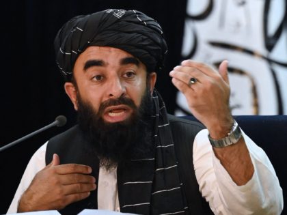 Taliban spokesman Zabihullah Mujahid addresses a press conference in Kabul on September 7, 2021. - The Taliban on September 7 announced UN-sanctioned Taliban veteran Mullah Mohammad Hassan Akhund as the leader of their new government, while giving key positions to some of the movement's top officials. (Photo by Aamir QURESHI …