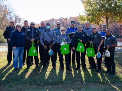 The Henrico Police Department (HPD) in Virginia joined forces with an anonymous donor Friday to deliver Thanksgiving meals to families in the area (Facebook/Henrico County Police)