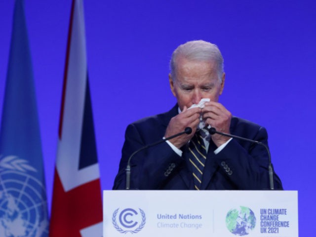 GLASGOW, SCOTLAND - NOVEMBER 01: U.S. President Joe Biden uses a tissue as he speaks durin