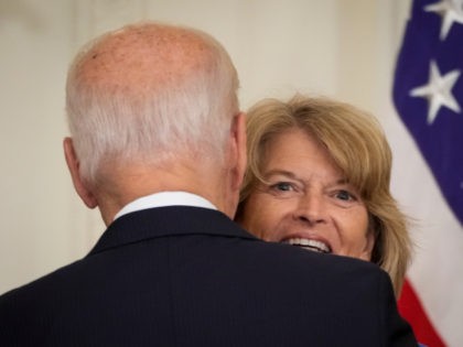 U.S. President Joe Biden talks with Sen. Lisa Murkowski (R-AK) after signing the VOCA Fix to Sustain the Crime Victims Fund Act of 2021 into law in the East Room of the White House on July 22, 2021 in Washington, DC. The law adds a new source of revenue for …