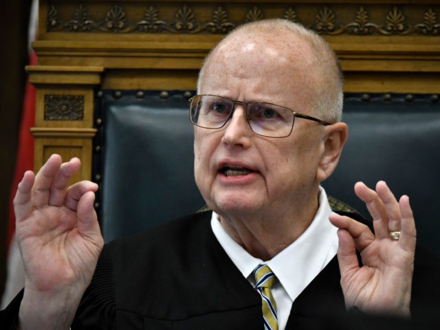 KENOSHA, WISCONSIN - NOVEMBER 10: Judge Bruce Schroeder, reprimands Assistant District Attorney Thomas Binger in his conduct in line of questioning while cross-examining Kyle Rittenhouse during the Kyle Rittenhouse trial at the Kenosha County Courthouse on November 10, 2021 in Kenosha, Wisconsin. Rittenhouse is accused of shooting three demonstrators, killing …