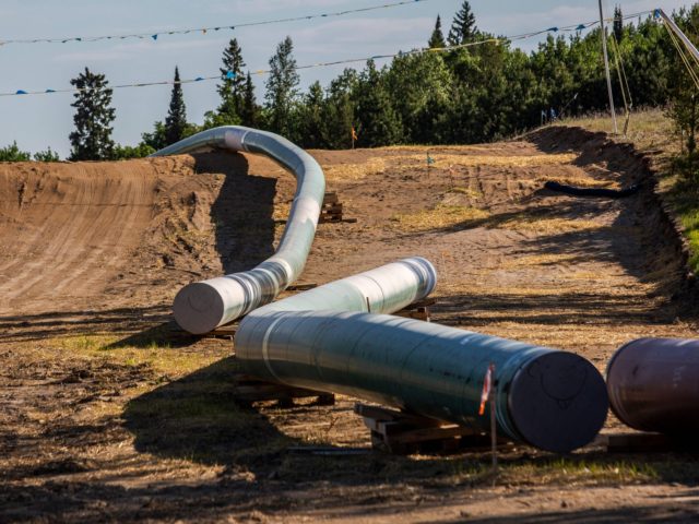 Sections of the Enbridge Line 3 pipeline are seen on the construction site on the White Earth Nation Reservation near Wauburn, Minnesota, on June 5, 2021. - Indigenous leaders and climate activists are gathering in northern Minnesota to protest the construction of the Line 3 oil pipeline. Line 3 is …