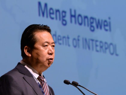 This photo taken on July 4, 2017 shows Meng Hongwei, president of Interpol, delivering an addresses at the opening of the Interpol World Congress in Singapore. - The former Chinese head of Interpol, who went missing last month, was accused of accepting bribes on October 8, becoming the latest top …