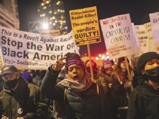 People march outside Barclay center, Wednesday, Nov. 17, 2021, in New York. Kyle Rittenhou