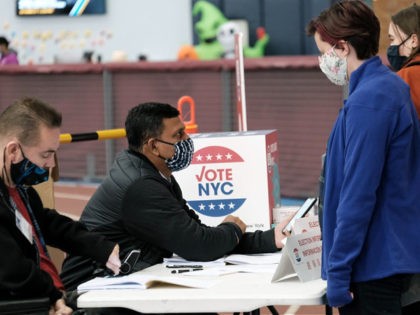 NEW YORK, NEW YORK - NOVEMBER 02: People visit a voting site at a YMCA on Election Day, No