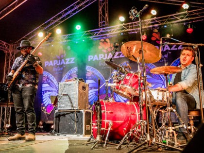 Etienne M'Bappé (L) of Cameroon, with Nec+, performs during the 15th edition of the Port-au-Prince International Jazz Festival "PAPJAZZ" on January 16, 2021. - It is one of the few places on Earth where concerts can still be attended: the 15th edition of the Port-au-Prince International Jazz Festival defies the …