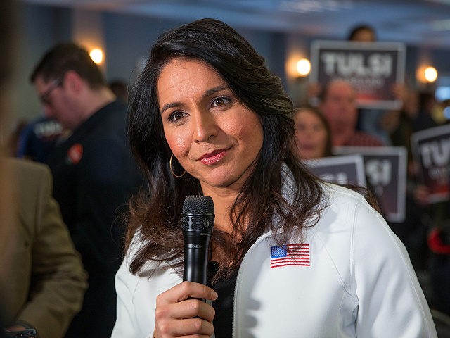 PORTSMOUTH, NH - FEBRUARY 09: Democratic presidential candidate Rep. Tulsi Gabbard (D-HI) answers media questions following a campaign event on February 9, 2020 in Portsmouth, New Hampshire. The first in the nation primary is on Tuesday, February 11. (Photo by Scott Eisen/Getty Images)