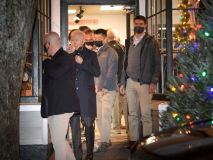 US President Joe Biden walks out of Murray's Toggery Shop, in Nantucket, Massachusetts on