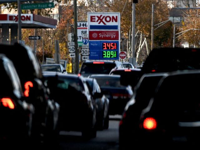 The price of gas is seen as traffic moves through Annapolis, MD, on November 23, 2021. - W