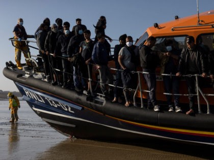 DUNGENESS, ENGLAND - SEPTEMBER 07: A group of migrants arrive via the RNLI (Royal National
