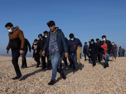 DUNGENESS, ENGLAND - SEPTEMBER 07: A group of migrants arrive via the RNLI (Royal National